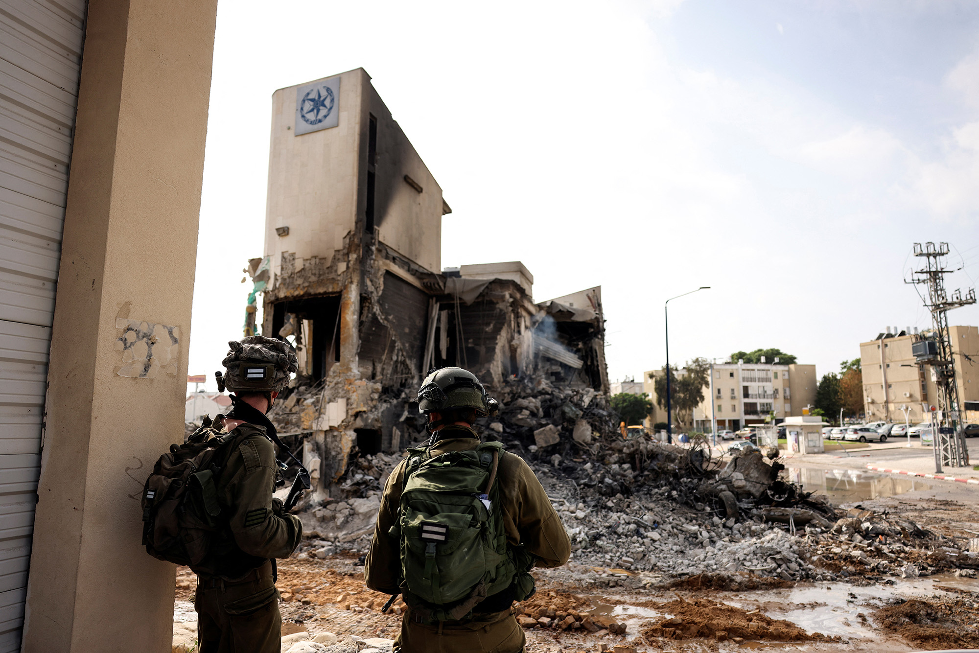 Israel's military says it has retaken control of all communities around Gaza