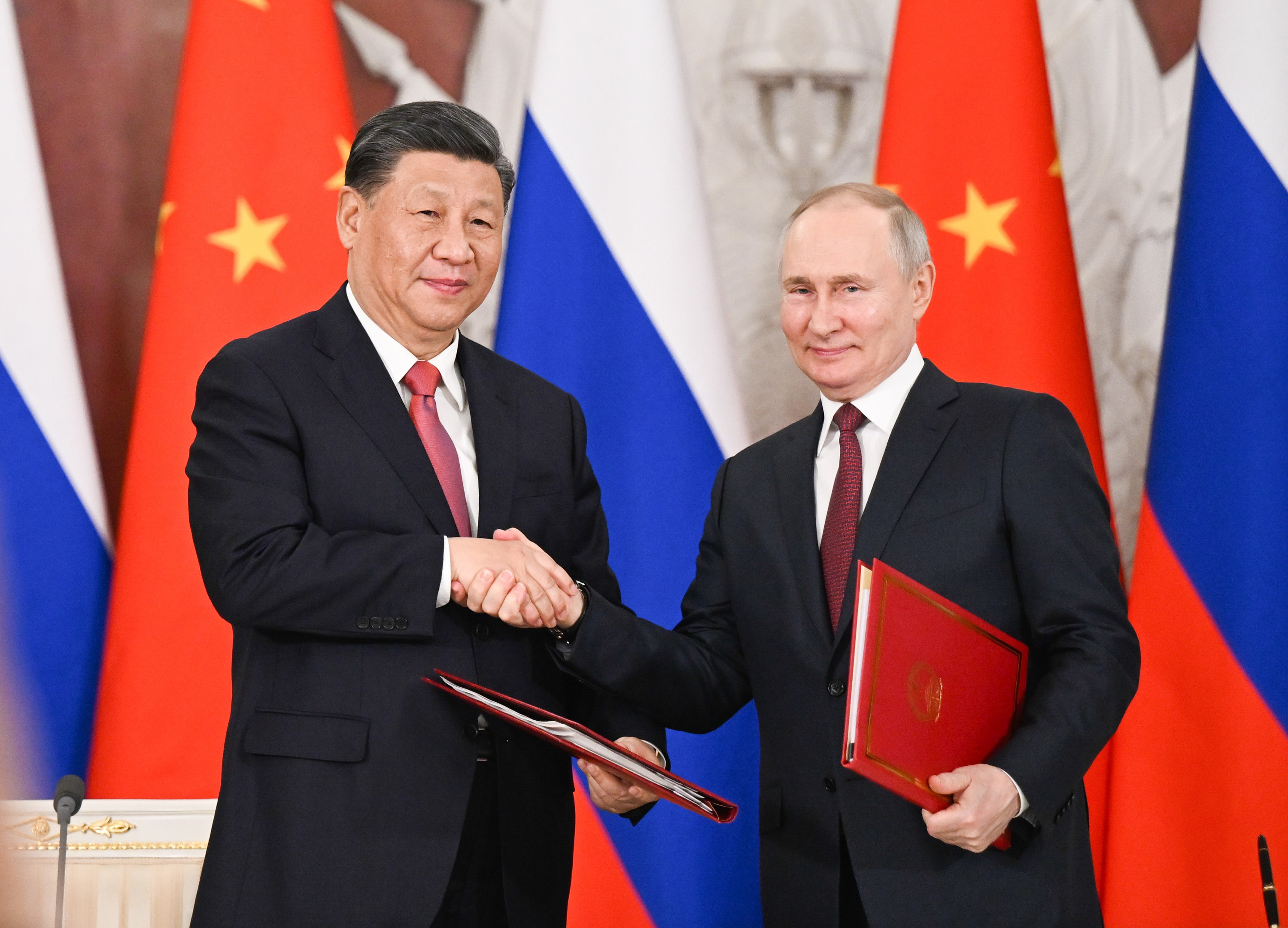 Russia and China 'not creating a military alliance' - Putin