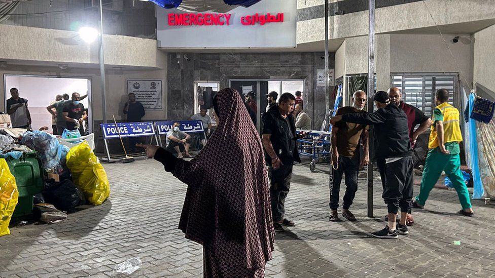 Hospital director says 179 bodies in mass grave